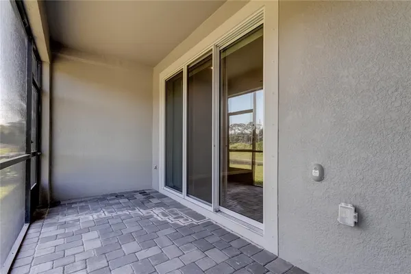a view of a glass door of the house