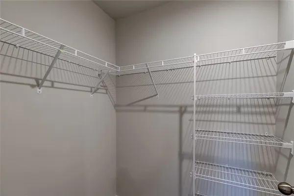 a view of a room with racks on the wall