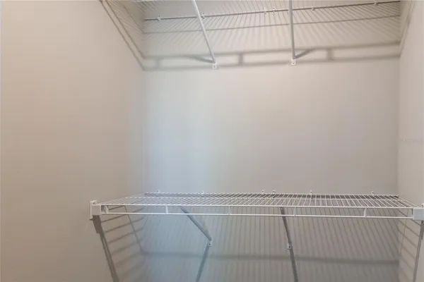 a view of a house with yard and plants