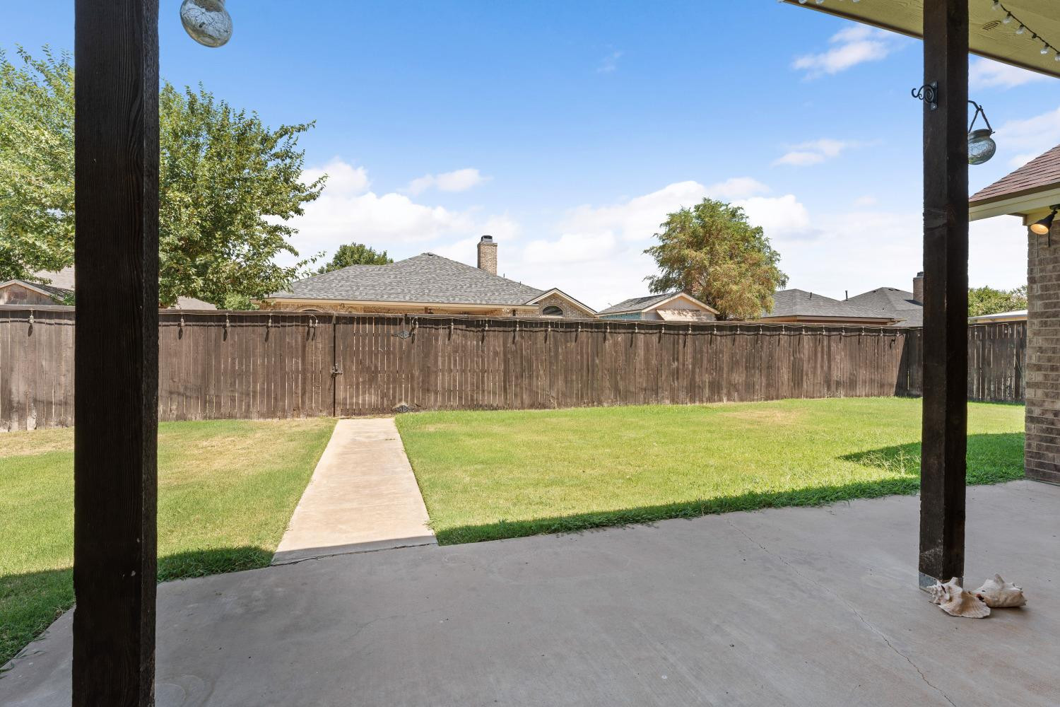5614 100th Street Lubbock, TX 79424 - Photo 27 of 27 a view of a garden with a slide
