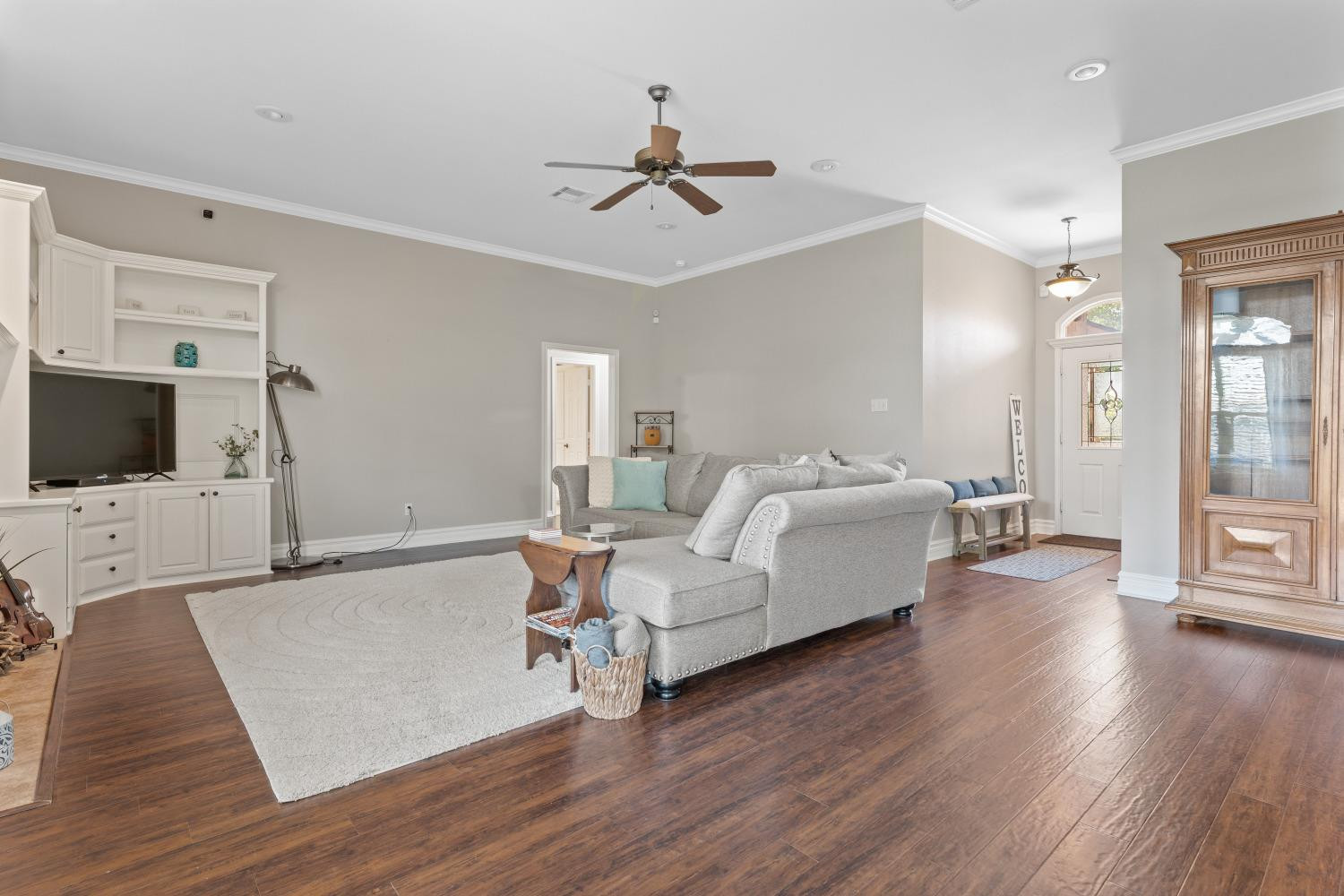 5614 100th Street Lubbock, TX 79424 - Photo 6 of 27 a spacious bedroom with a bed and a flat screen tv