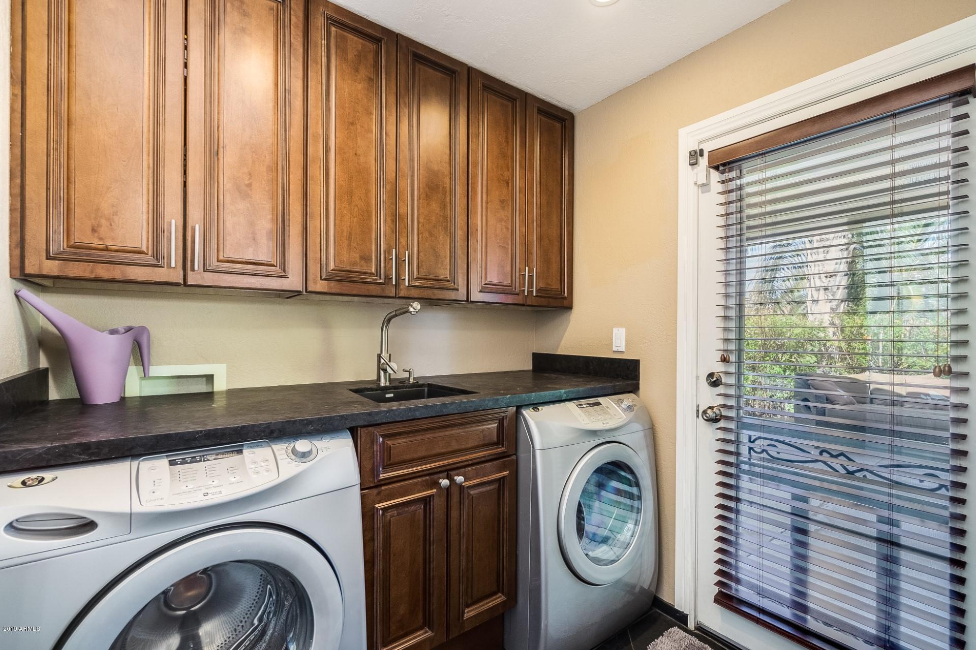 5319 North 15th Street Phoenix, AZ 85014 - Photo 28 of 33 a utility room with dryer and washer