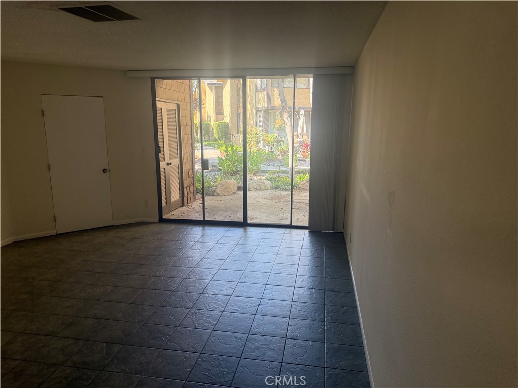 12750 Centralia Street, Unit 191 Lakewood, CA 90715 - Photo 16 of 38 a view of an empty room and window