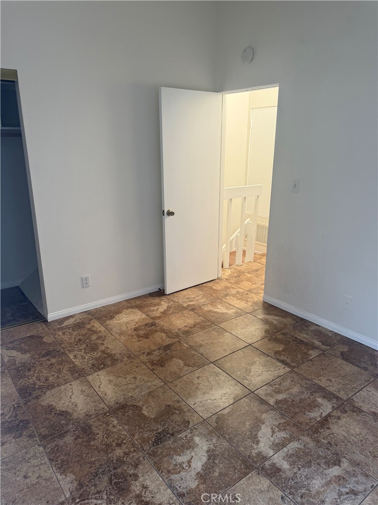 12750 Centralia Street, Unit 191 Lakewood, CA 90715 - Photo 23 of 38 a view of an empty room and window