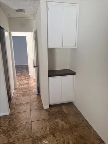 a view of a utility room with a sink