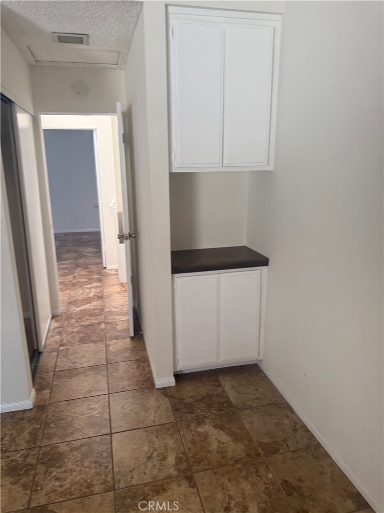 12750 Centralia Street, Unit 191 Lakewood, CA 90715 - Photo 30 of 38 a view of a utility room with a sink