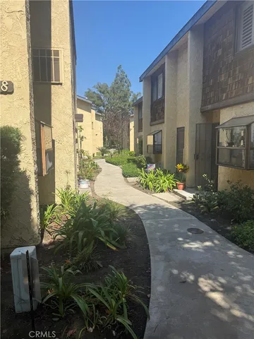 a view of a building with a yard