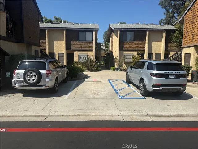 a car parked in front of a house