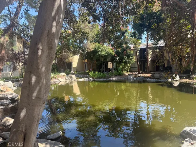 a view of a large body of water with water fall