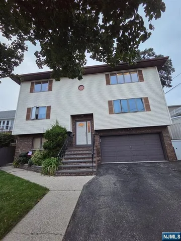 front view of house with a yard