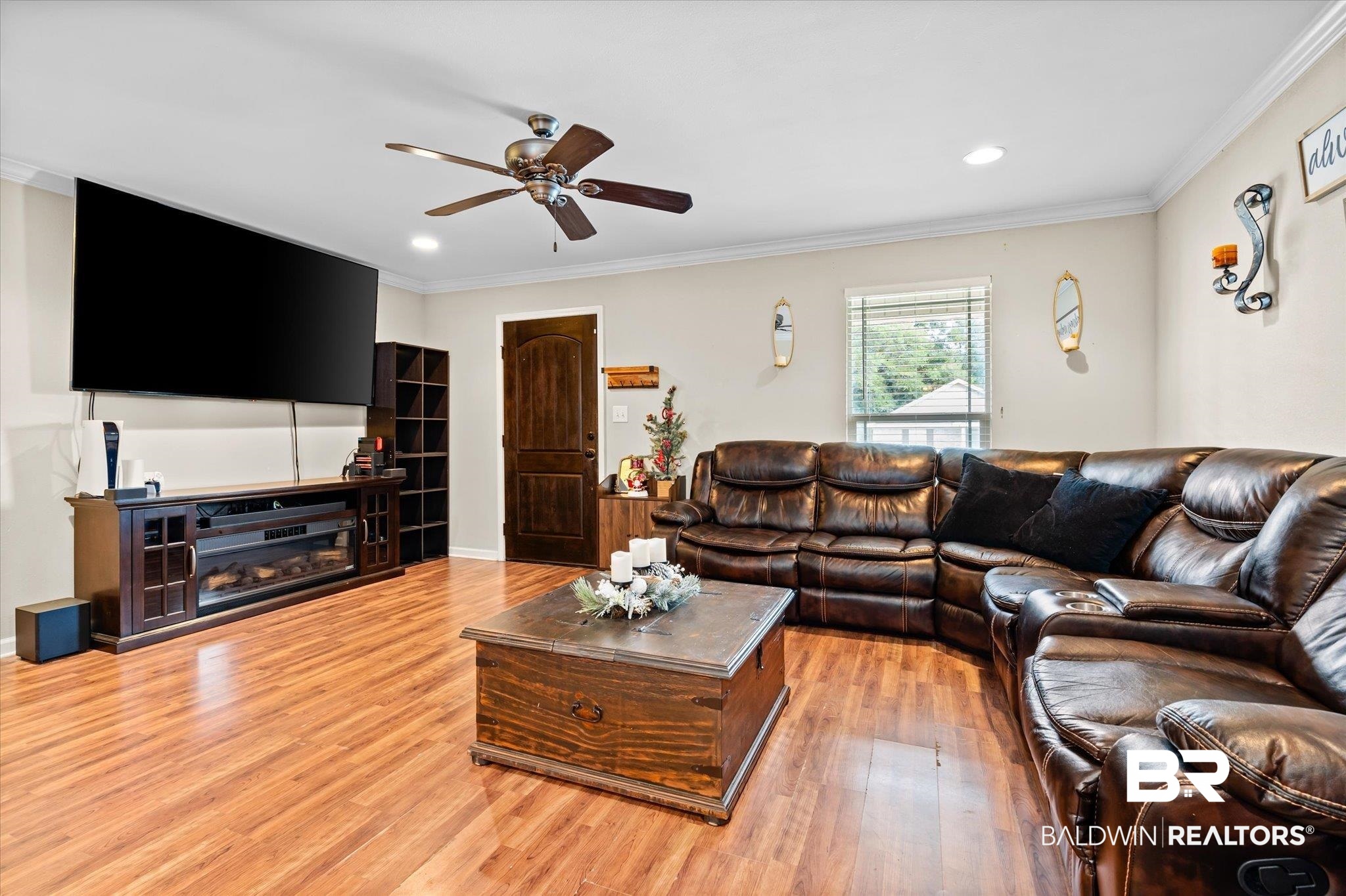 2855 Rebecca Drive West Mobile, AL 36618 - Photo 4 of 22 Living room with hardwood / wood-style flooring, ceiling fan, and crown molding