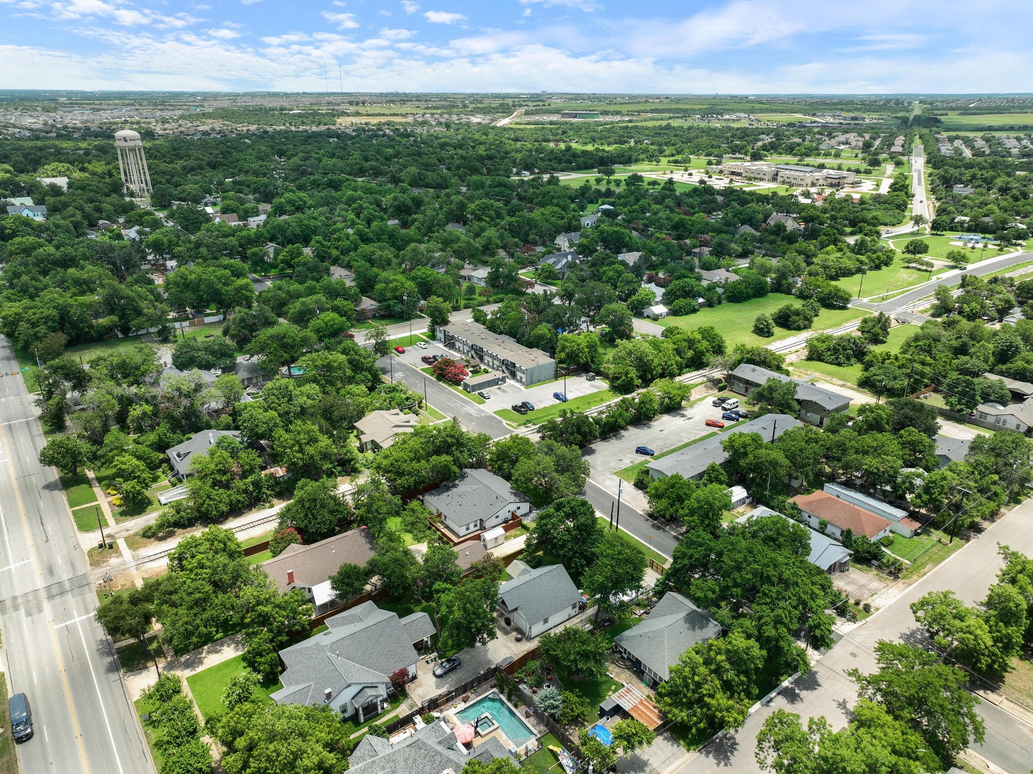 810 East University Avenue Georgetown, TX 78626 - Photo 38 of 38 an aerial view of residential houses with outdoor space and trees