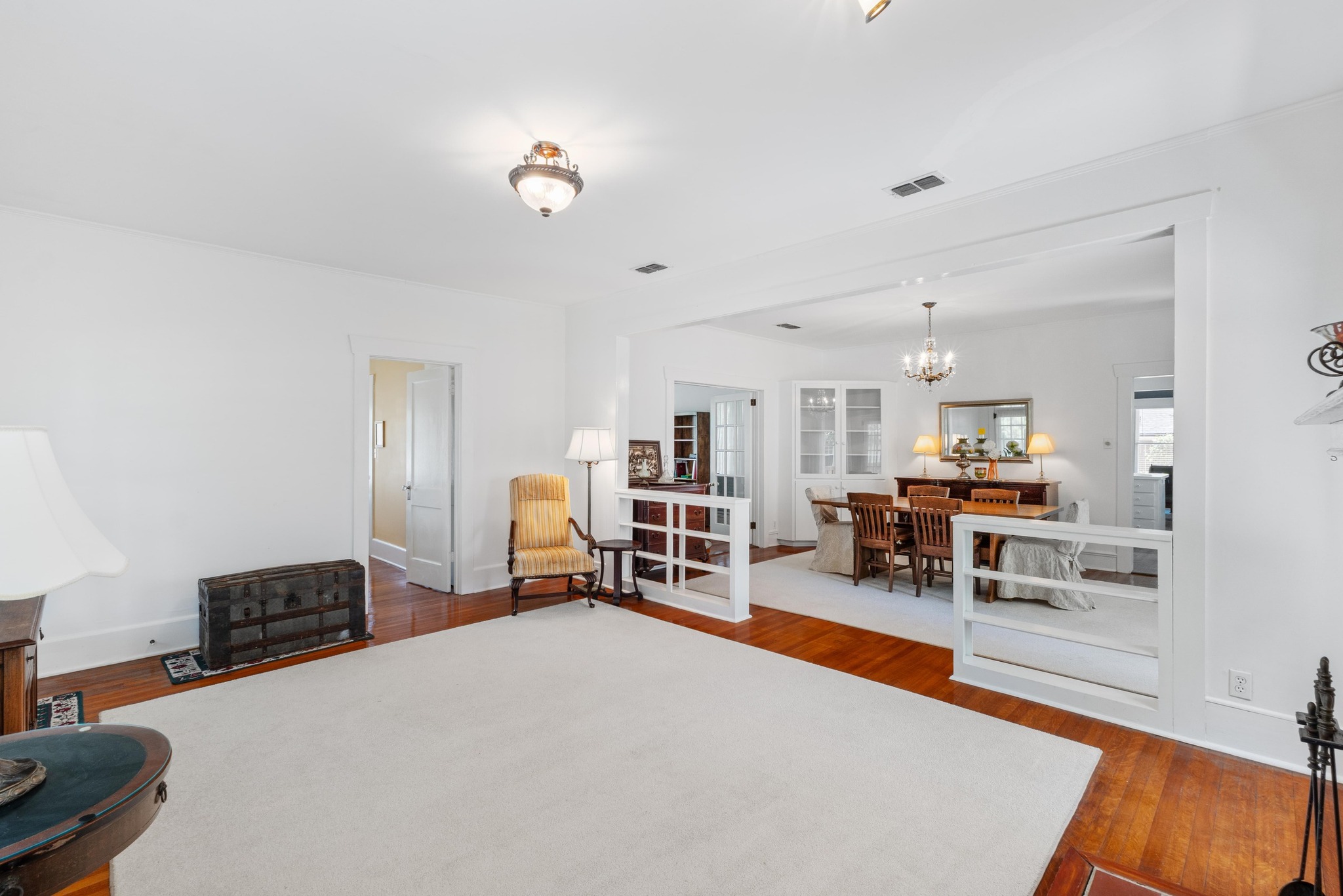 810 East University Avenue Georgetown, TX 78626 - Photo 7 of 38 a living room with furniture and a wooden floor
