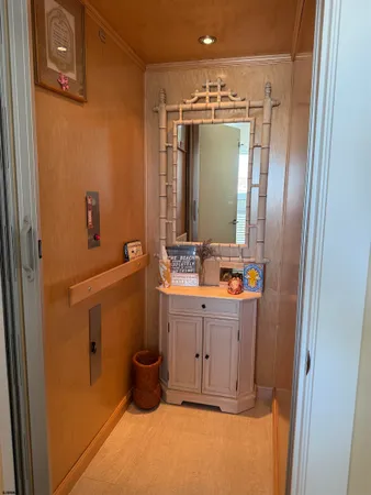 a bathroom with a sink a mirror and shower