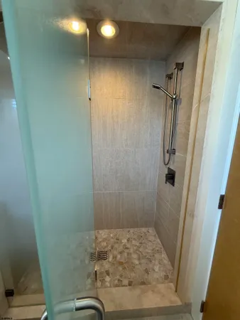 a bathroom with a sink and a shower