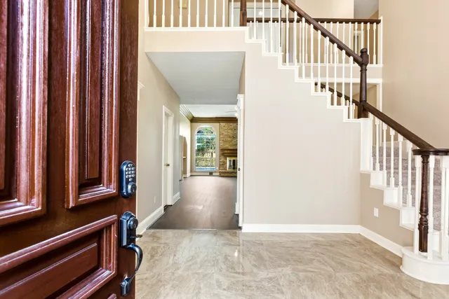 a view of an entryway with staircase