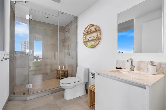 a view of city with tall buildings