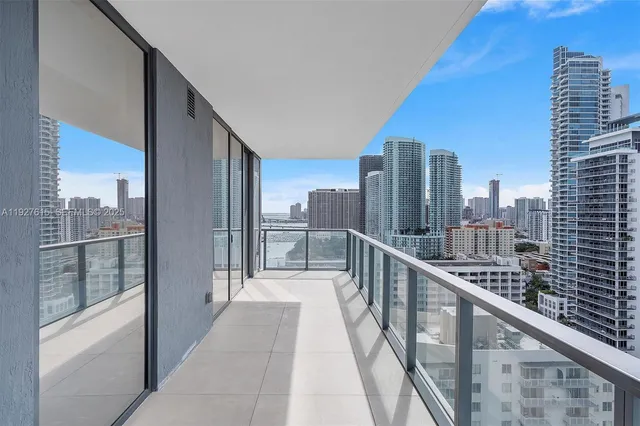 a view of a city with tall buildings