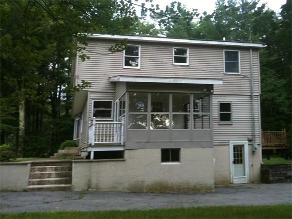 10 Mulpus Road Lunenburg, MA 01462 - Photo 2 of 13 a front view of a house with a yard