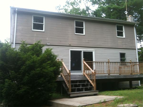10 Mulpus Road Lunenburg, MA 01462 - Photo 4 of 13 a view of house with yard and staircase