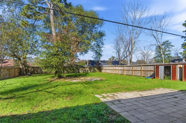 a view of backyard with green space
