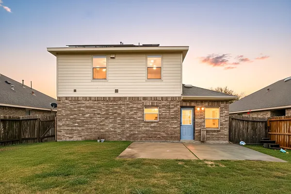 a front view of house with yard