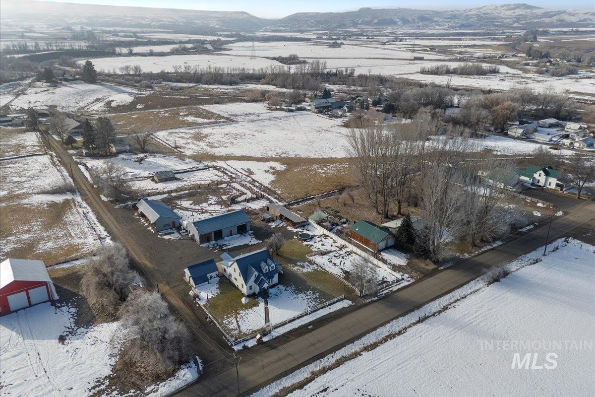 495 East Bridge Street Midvale, ID 83645 - Photo 47 of 48 Snowy aerial view featuring a mountain view