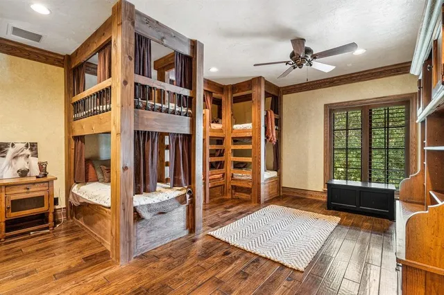 a view of living room kitchen with furniture and wooden floor