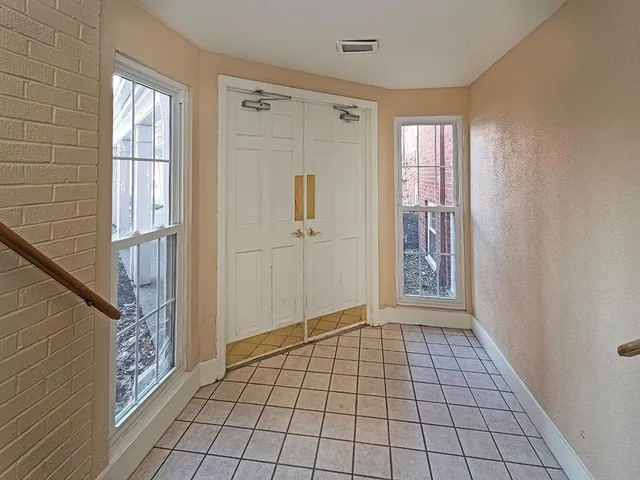 a view of an empty room with window