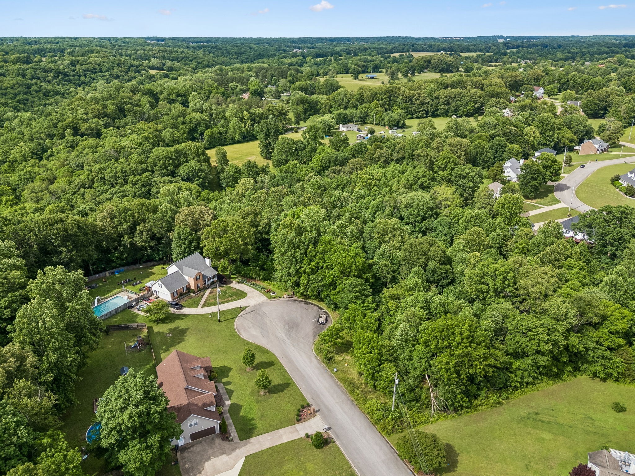 15 Rustling Oaks Court Pleasant View, TN 37146 - Photo 50 of 50 a view of a lake with an outdoor space