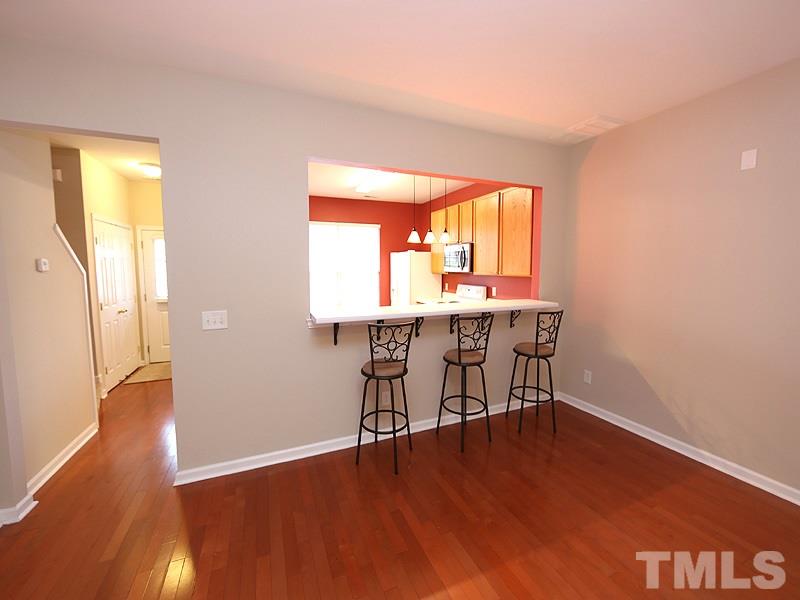 8519 Silhouette Place Raleigh, NC 27613 - Photo 6 of 19 a workspace with furniture and window