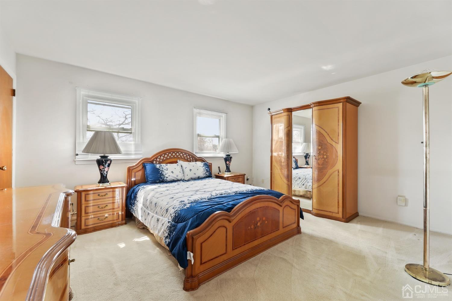 29 Ventnor Drive Edison, NJ 08820 - Photo 13 of 20 a bedroom with a bed and window