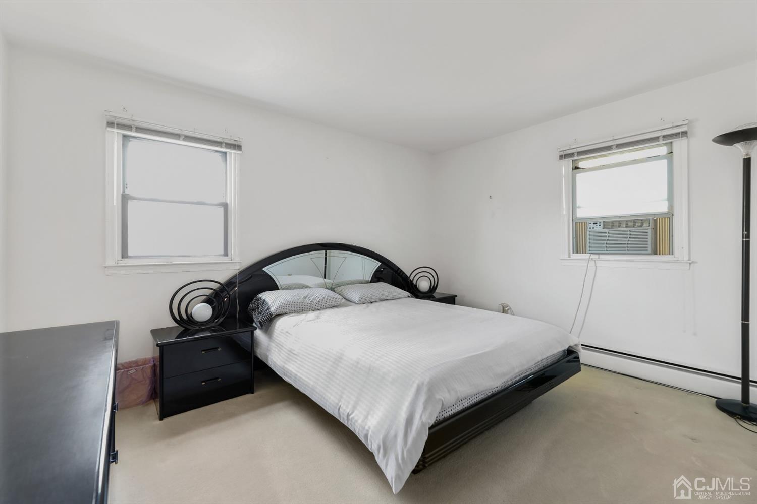 29 Ventnor Drive Edison, NJ 08820 - Photo 15 of 20 a bedroom with a bed and a window