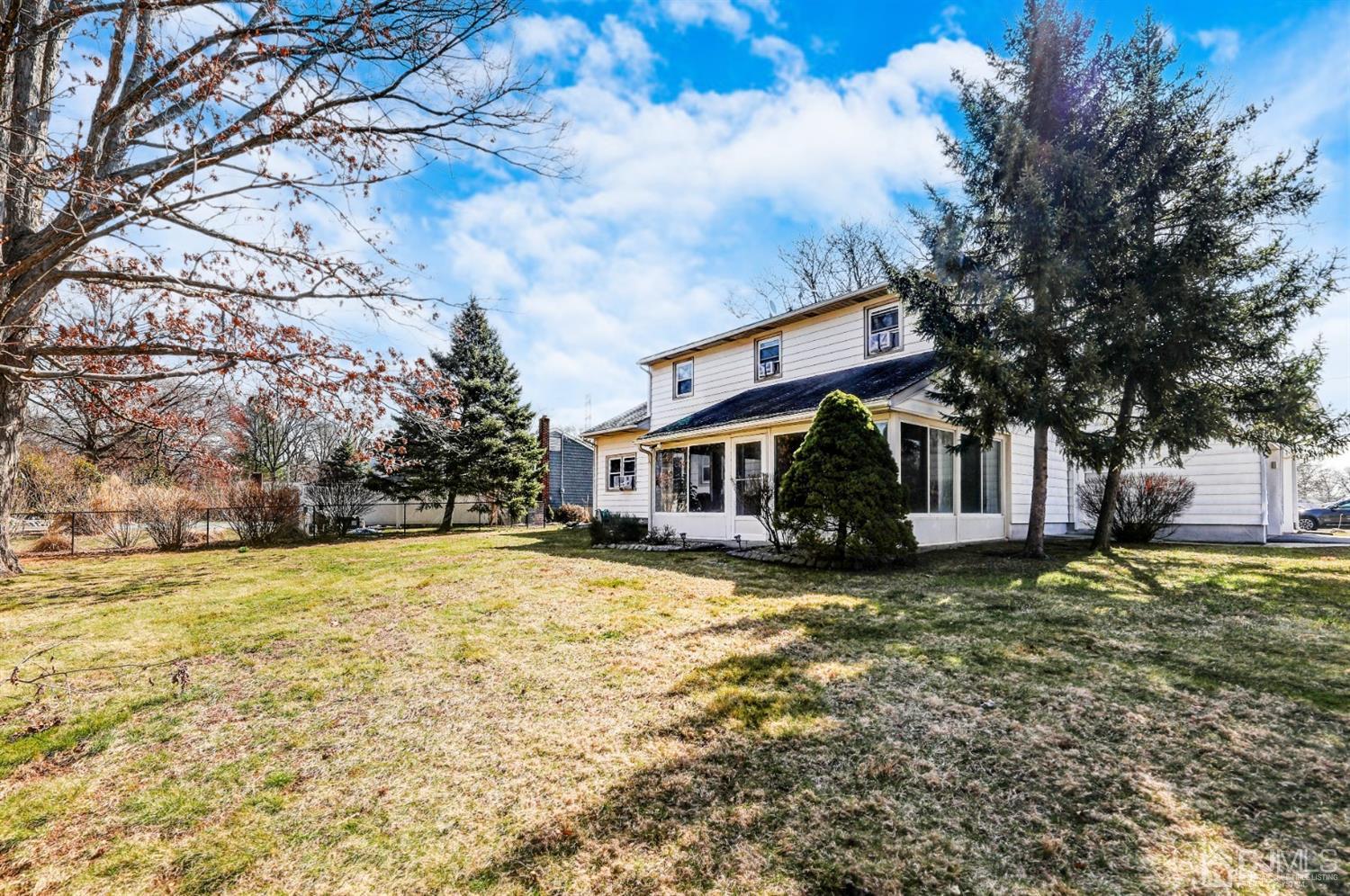 29 Ventnor Drive Edison, NJ 08820 - Photo 19 of 20 a view of a house with a yard and large tree