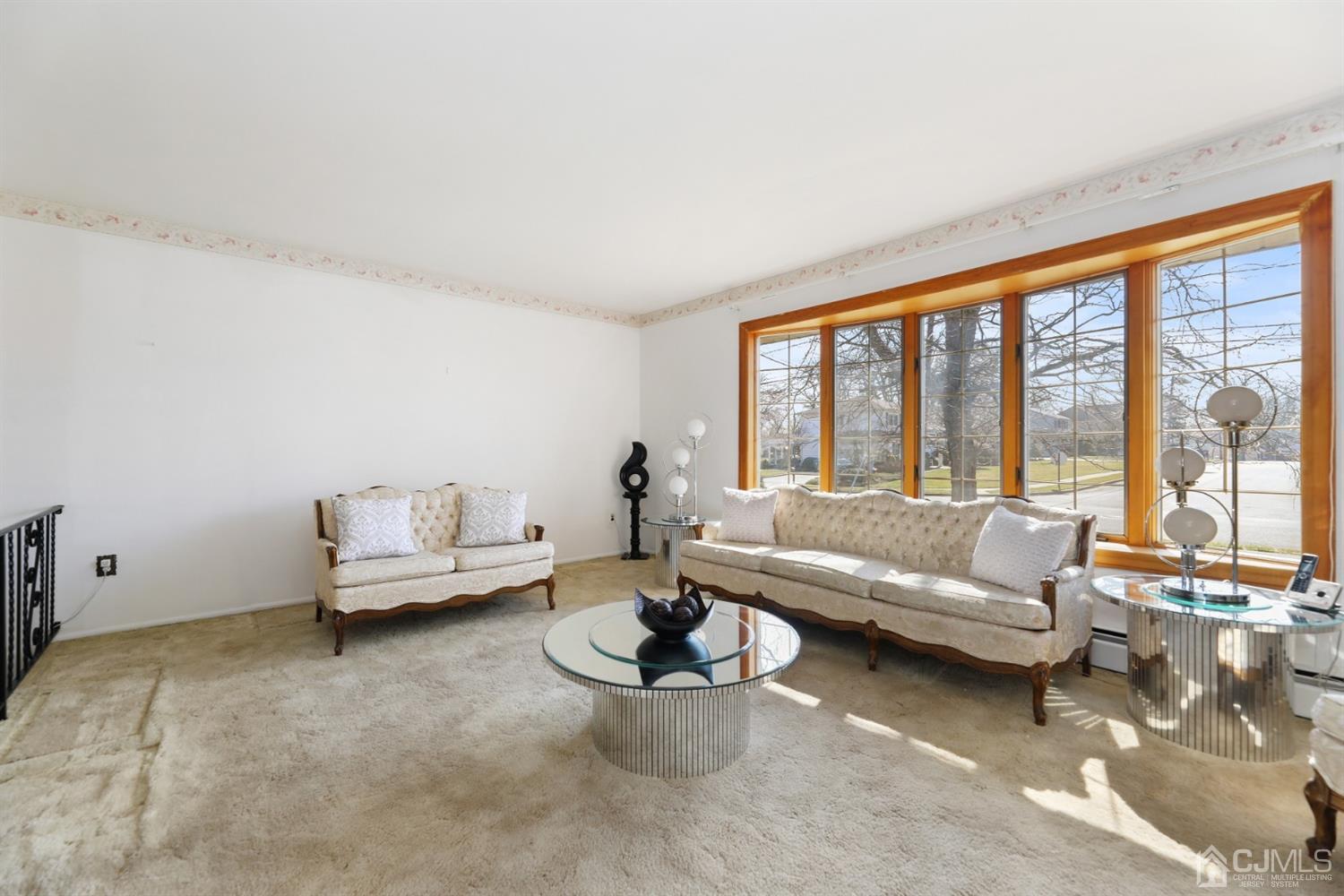 29 Ventnor Drive Edison, NJ 08820 - Photo 3 of 20 a living room with furniture and a large window