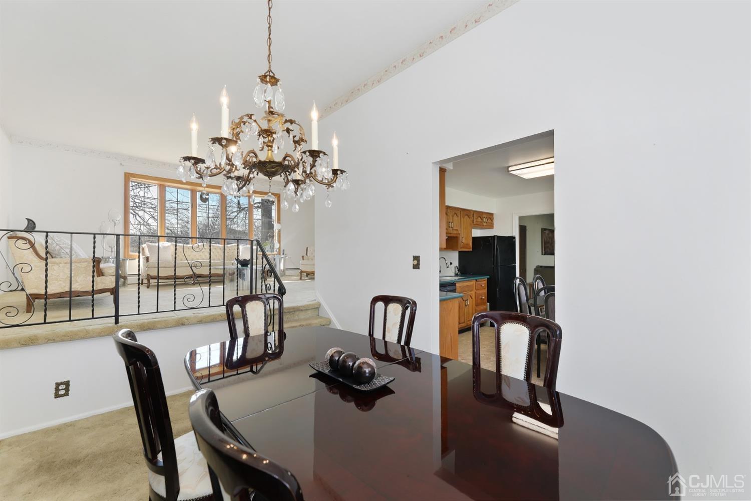 29 Ventnor Drive Edison, NJ 08820 - Photo 5 of 20 a view of a dining room with furniture and a chandelier