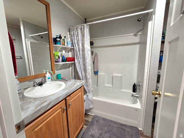 597 North State Street, Unit 67 Orem, UT 84057 - Photo 17 of 23 Bathroom featuring vanity and shower / tub combo