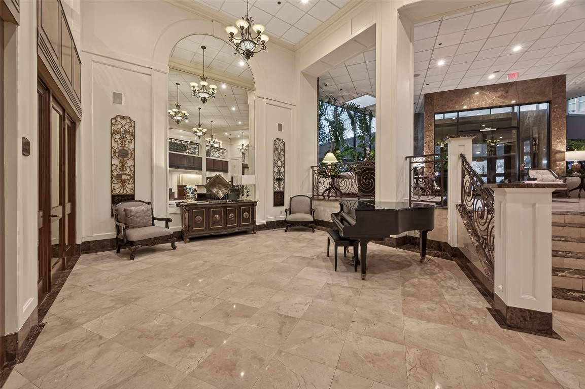 3525 Sage Road, Unit 1305 Houston, TX 77056 - Photo 17 of 30 a living room with furniture and a large window