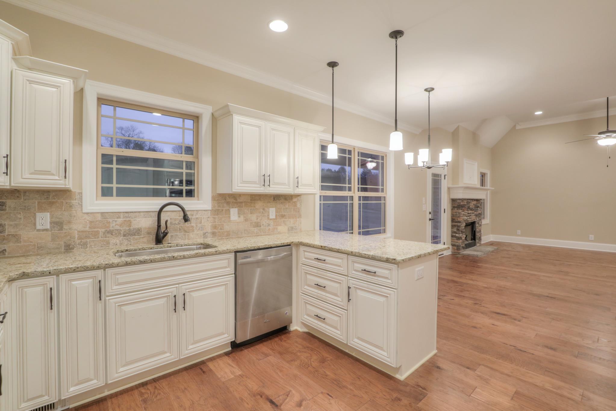 2231 Cairo Bend Road Lebanon, TN 37087 - Photo 12 of 29 a kitchen with white cabinets and sink