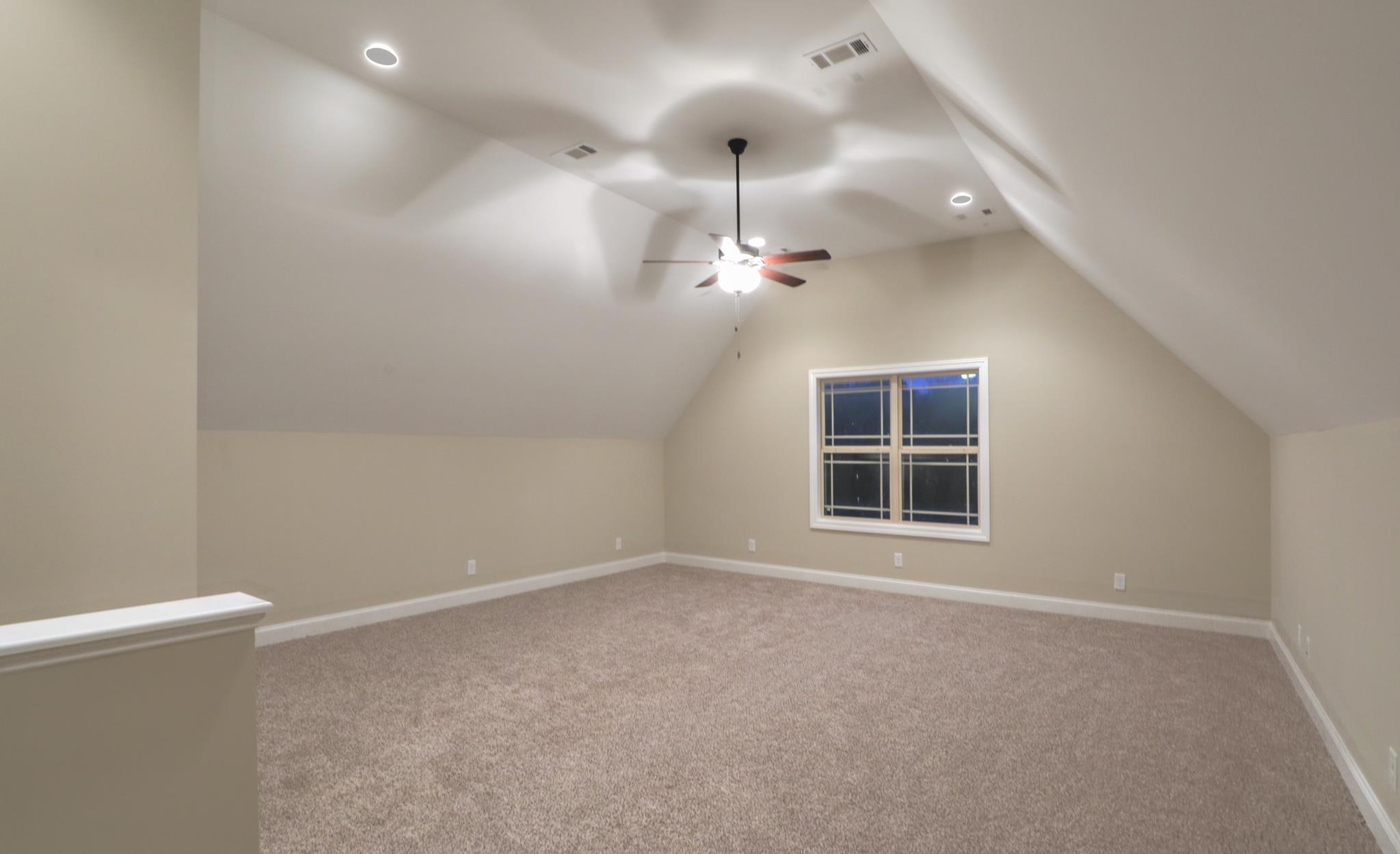 2231 Cairo Bend Road Lebanon, TN 37087 - Photo 22 of 29 en empty room with windows and ceiling fan