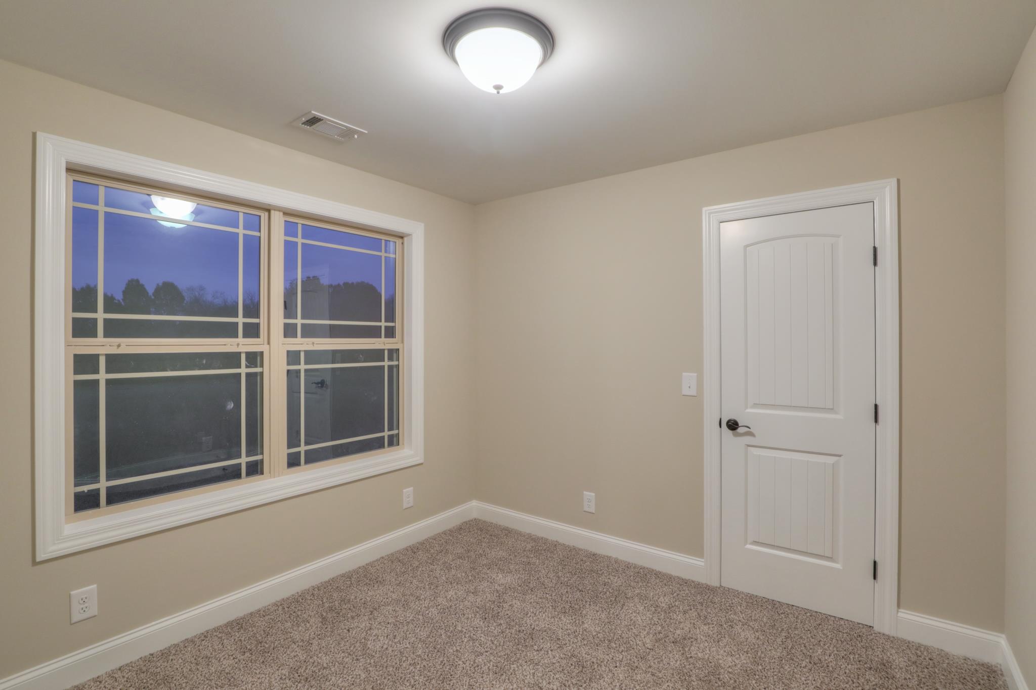 2231 Cairo Bend Road Lebanon, TN 37087 - Photo 23 of 29 a view of an empty room with a window