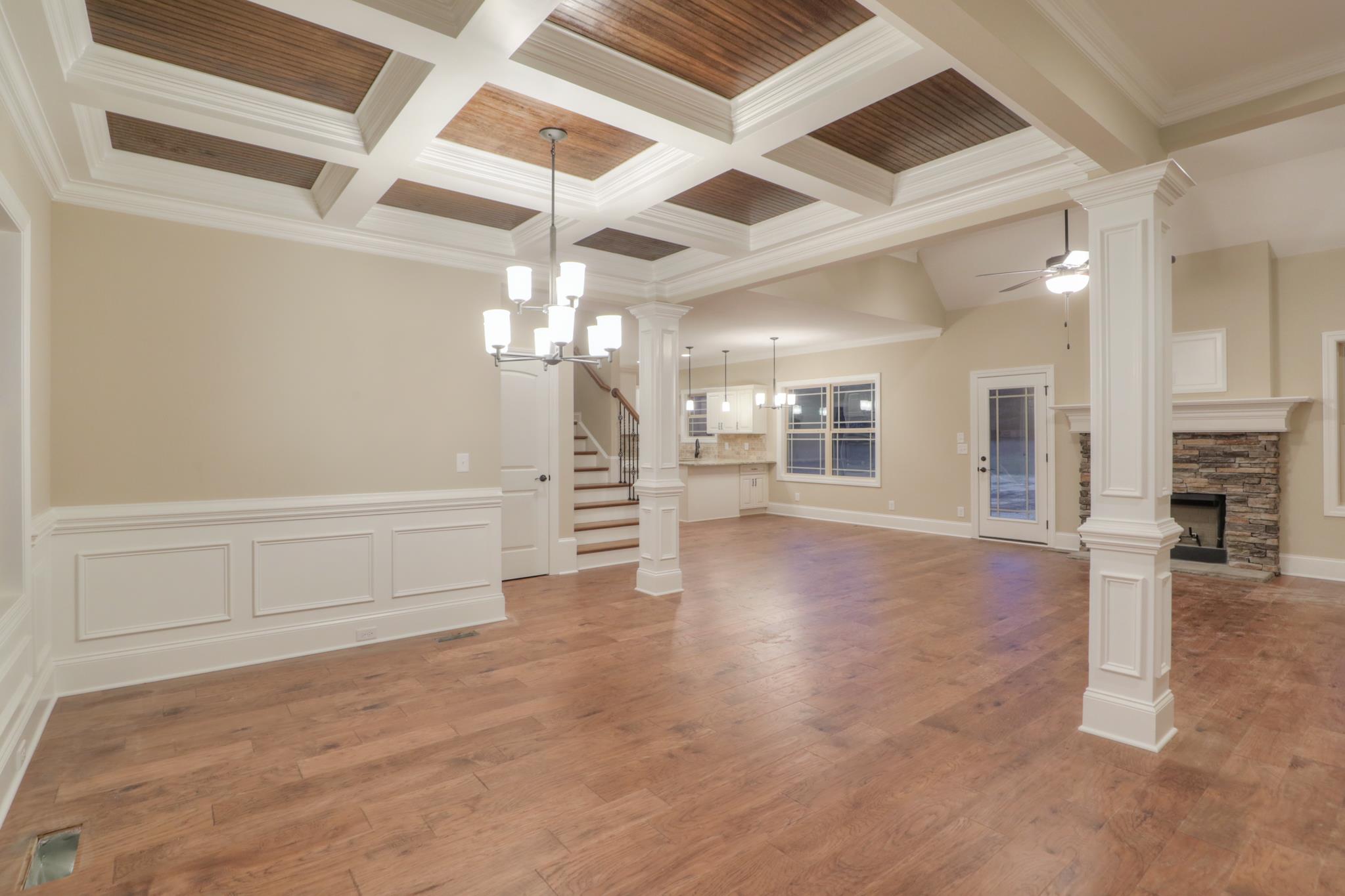 2231 Cairo Bend Road Lebanon, TN 37087 - Photo 5 of 29 wooden floor in an empty room with a fireplace