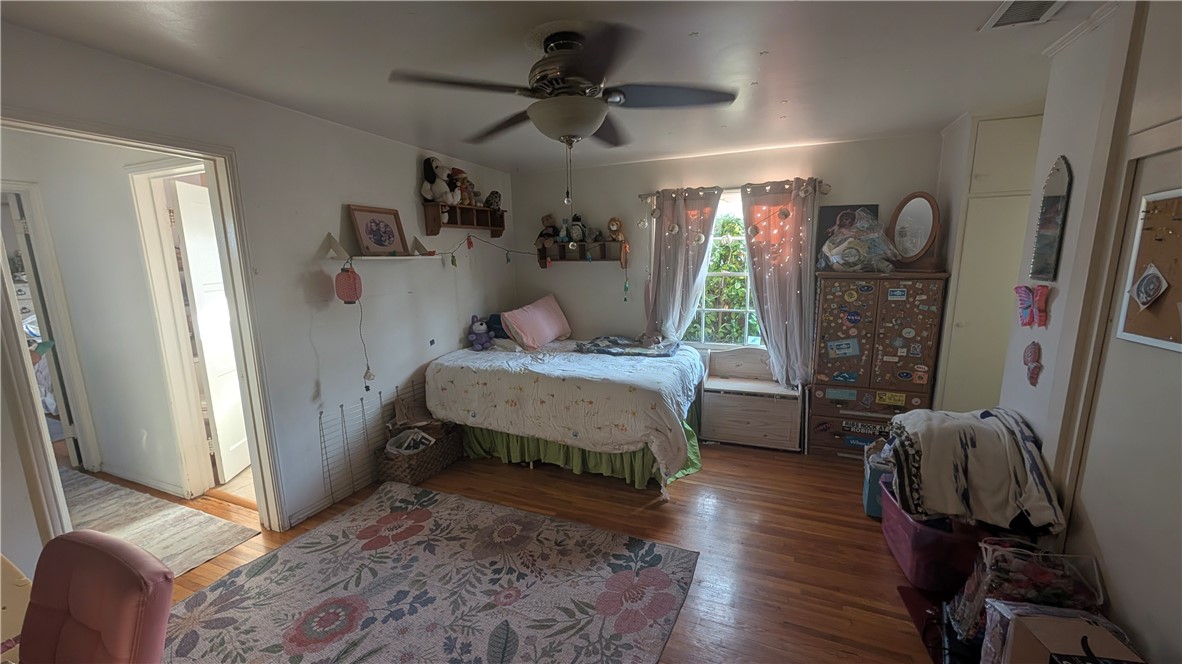 3762 Mohawk Street Pasadena, CA 91107 - Photo 13 of 20 a bedroom with furniture a bed and a window