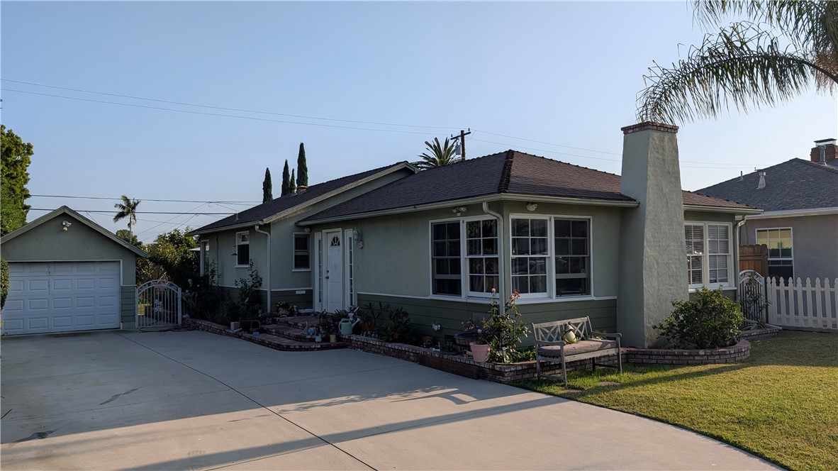 3762 Mohawk Street Pasadena, CA 91107 - Photo 2 of 20 a front view of a house with a garden