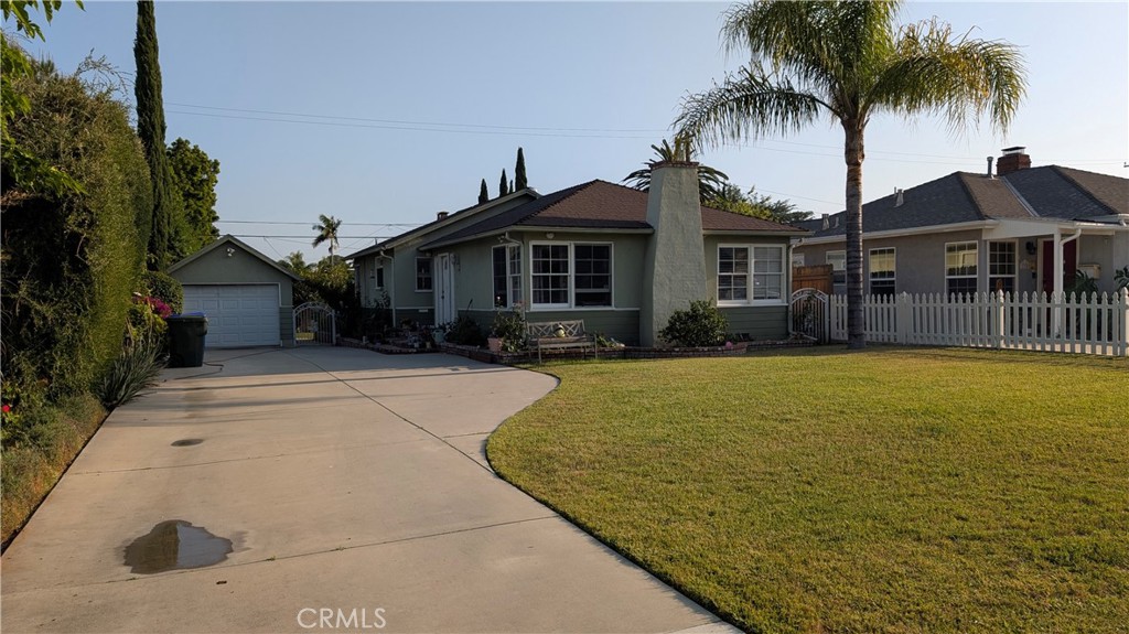 3762 Mohawk Street Pasadena, CA 91107 - Photo 3 of 20 a front view of house with yard and palm tree