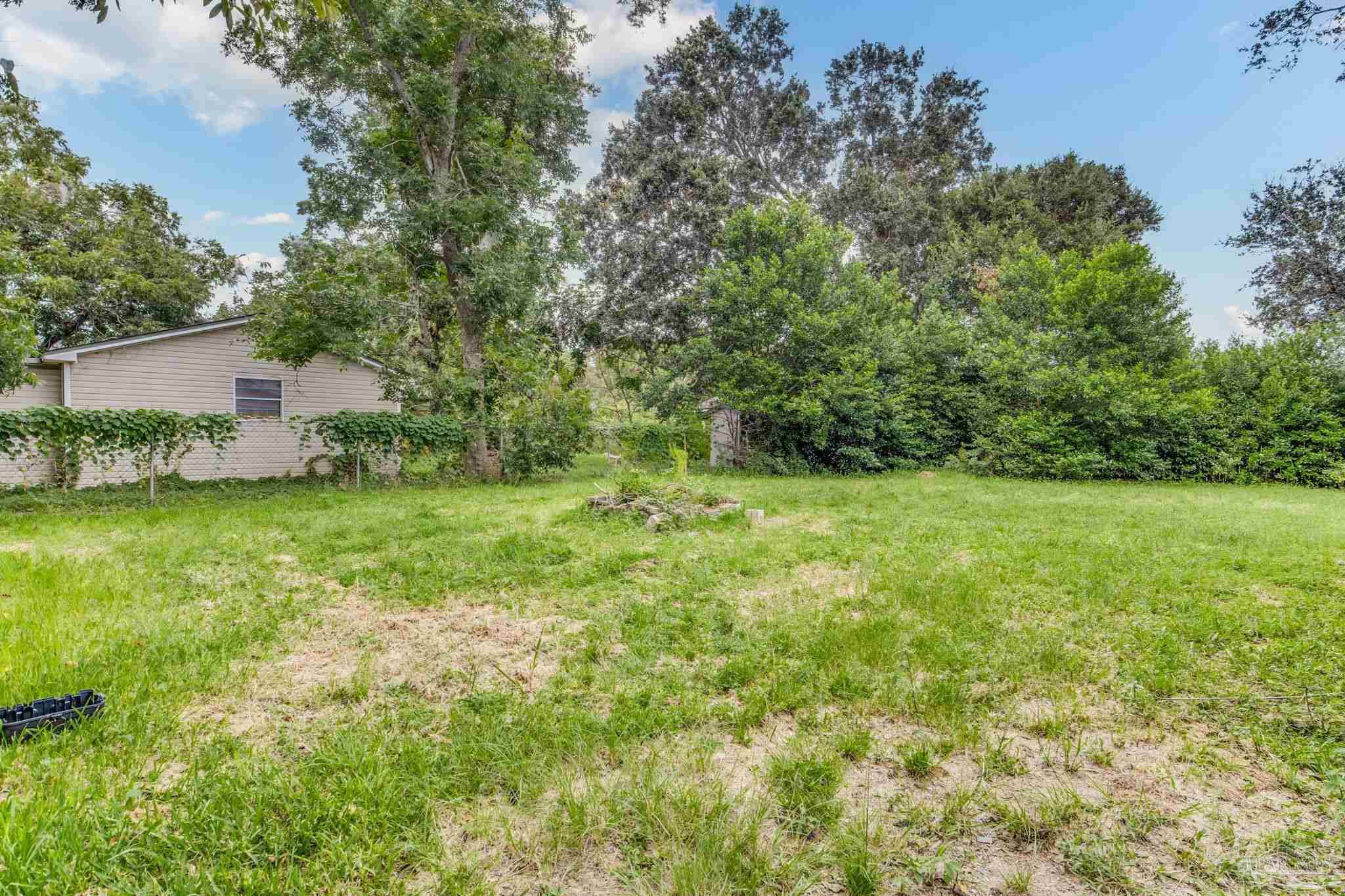 1422 Starlight Drive Cantonment, FL 32533 - Photo 44 of 49 a view of yard with green space