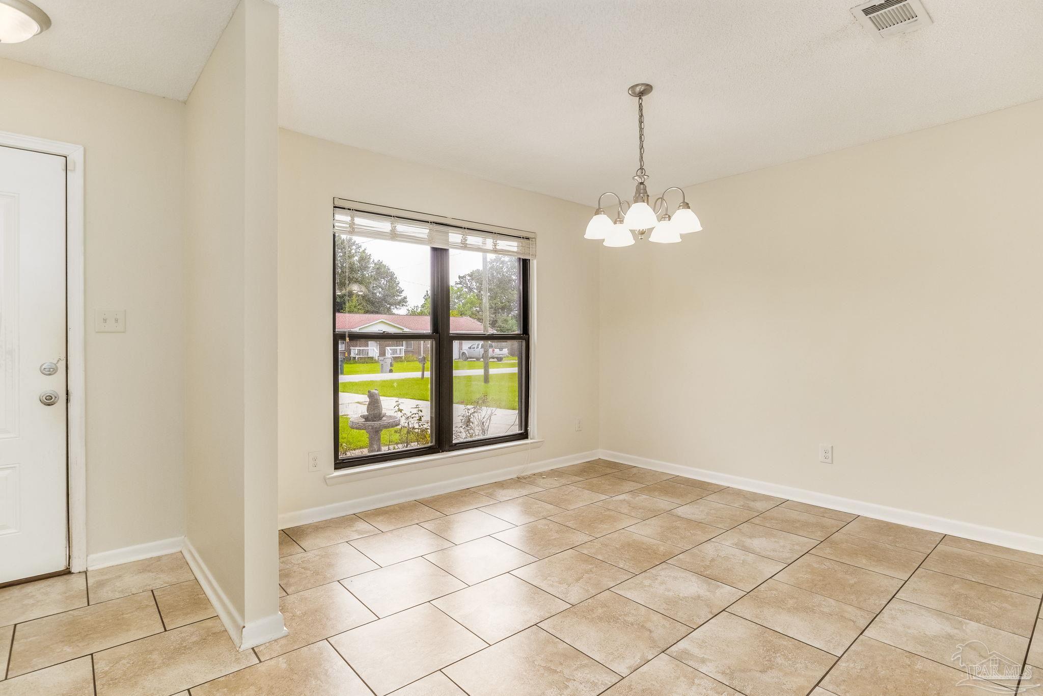 1422 Starlight Drive Cantonment, FL 32533 - Photo 6 of 49 a view of a room with window