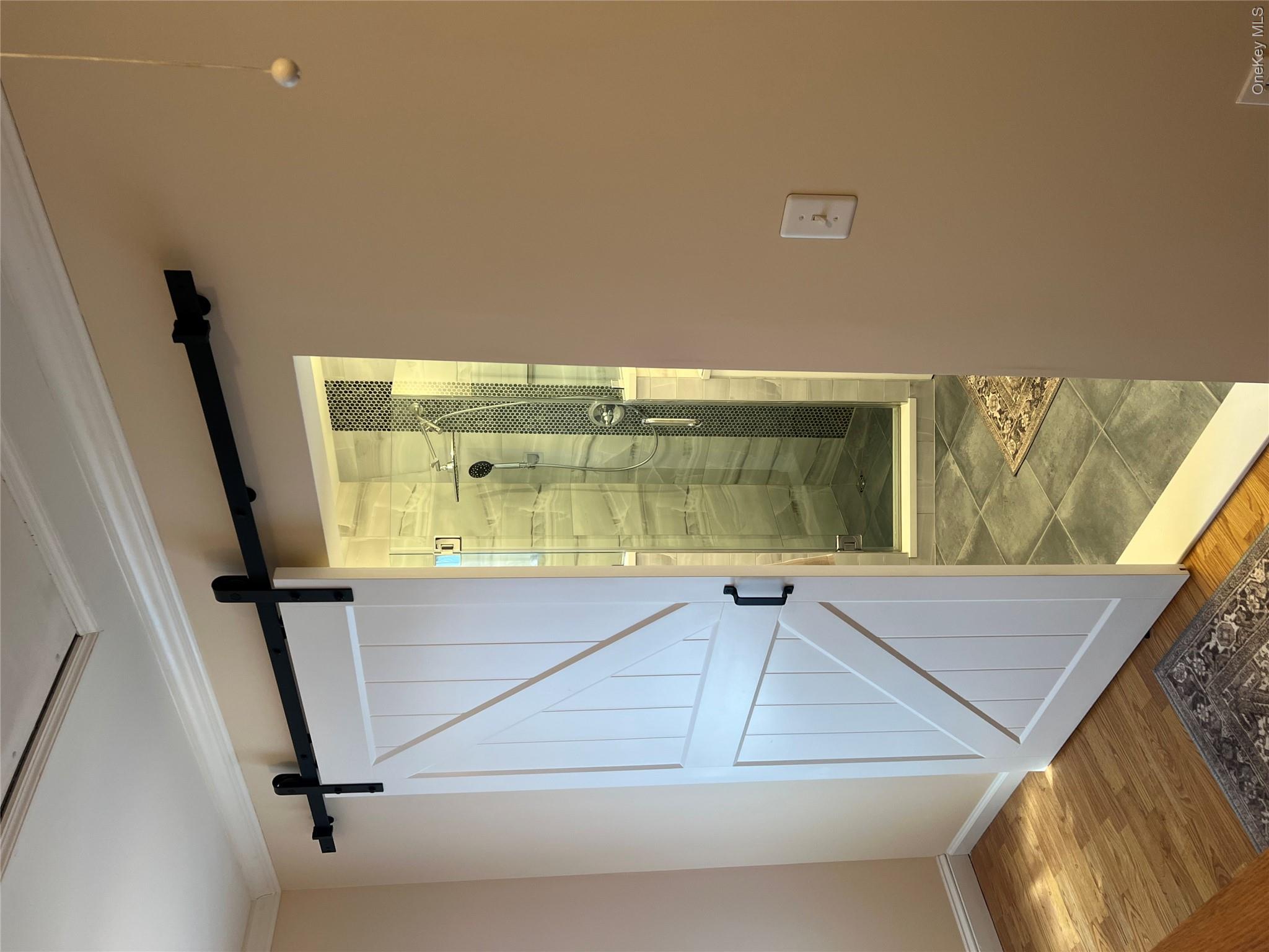 7 Pulaski Road, Unit 7 Fishkill, NY 12524 - Photo 17 of 38 Sliding barn door to 2nd floor full bath