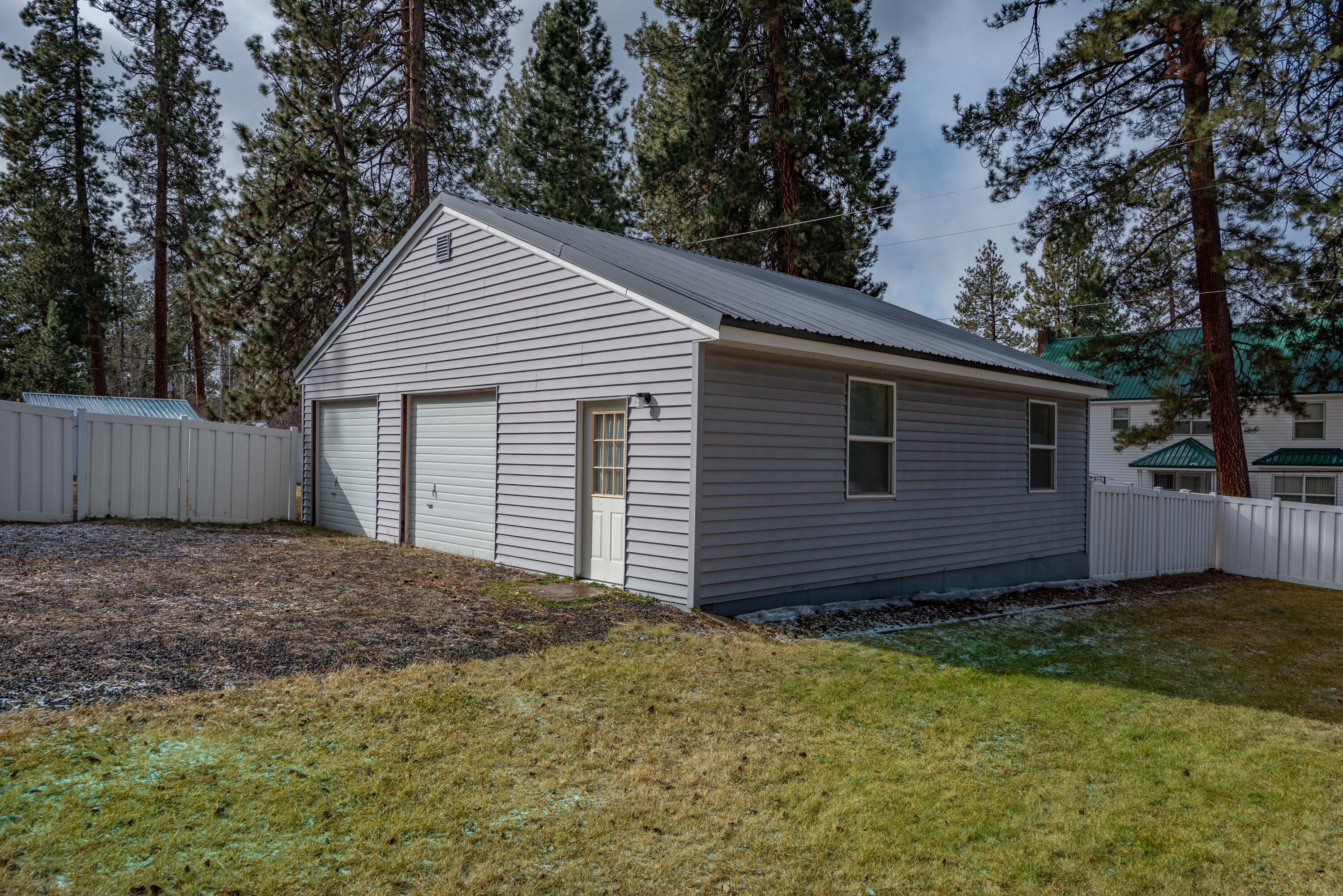 138722 Rhododendron Street Gilchrist, OR 97737 - Photo 5 of 36 a house with a backyard
