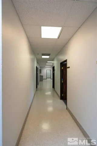 a kitchen with stainless steel appliances a refrigerator and a stove